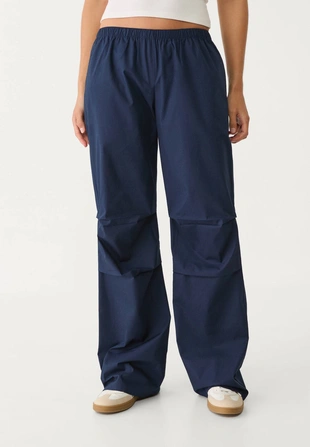 Брюки с низкой посадкой и эластичным поясом- Заказать в России