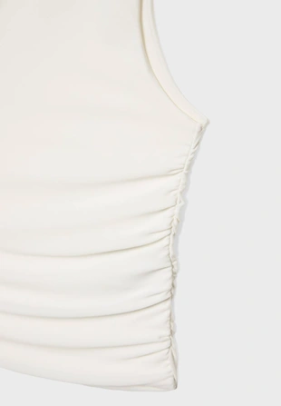 Укороченный топ асимметричного кроя со сборками- Заказать в России