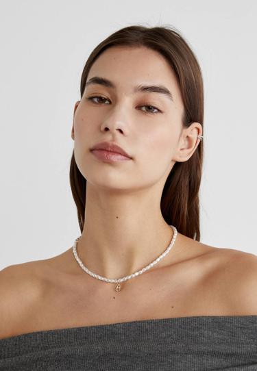 Stradivarius Набор из четырех ожерелий с подвесками “луна” и “солнце”