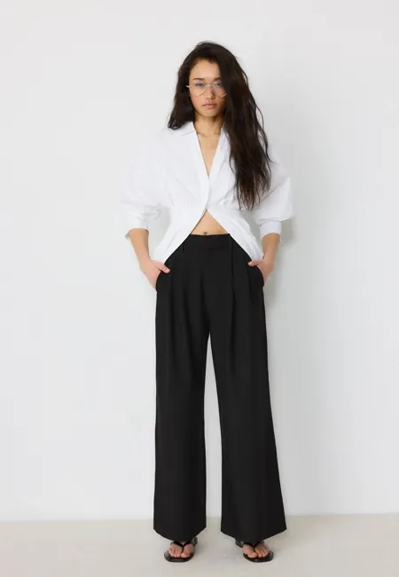 Регулируемые брюки очень широкого кроя- Заказать в России