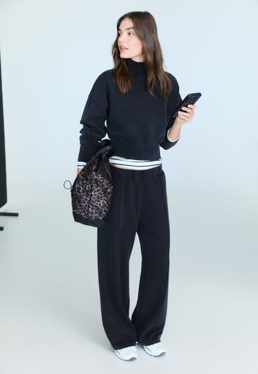 Брюки-джоггеры с эффектом потертости- Заказать в России