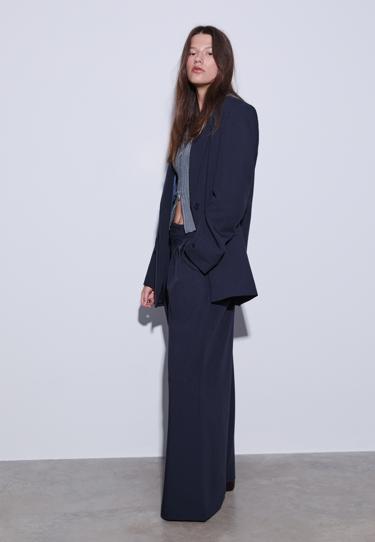 Брюки очень широкого кроя с регулируемой талией