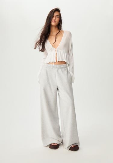 Stradivarius Блузка с оборками и завязками купить с доставкой.