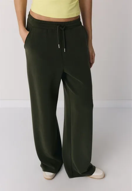 Брюки-джоггеры палаццо, мягкие на ощупь- Заказать в России
