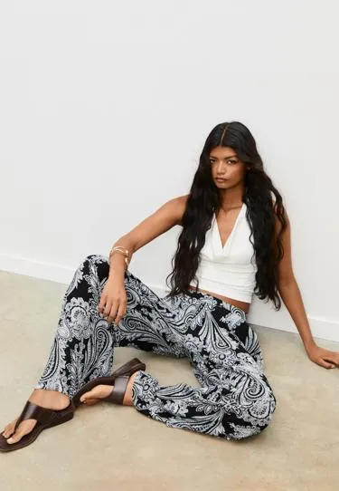 Свободные брюки палаццо с принтом- Заказать в России
