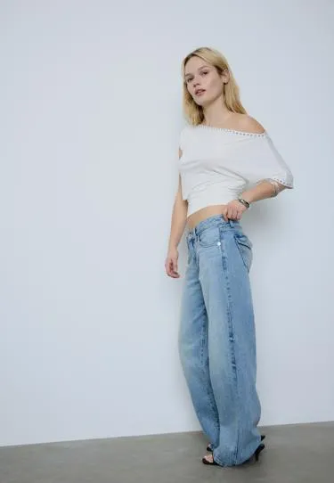 Асимметричная футболка с заклепками- Заказать в России