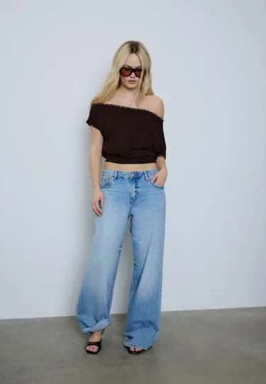 Асимметричная футболка с заклепками- Заказать в России