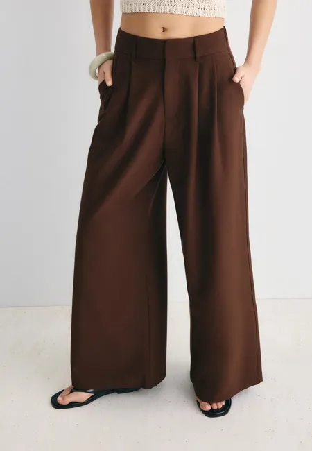 Регулируемые брюки очень широкого кроя- Заказать в России