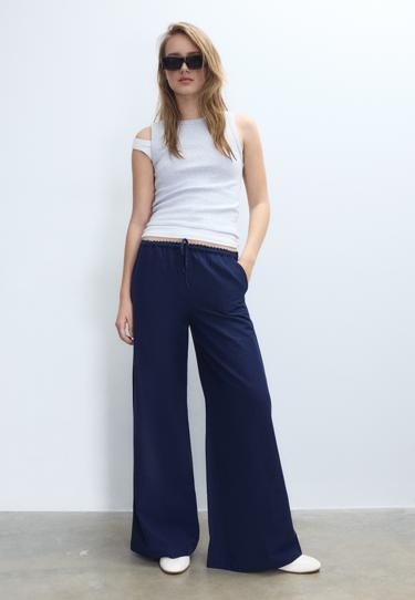 Брюки свободного кроя под лен- Заказать в России