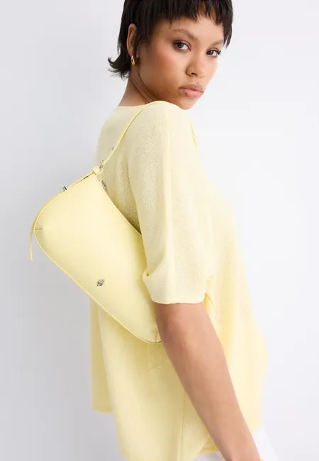 Удлиненная сумка на плечо с люверсами- Заказать в России