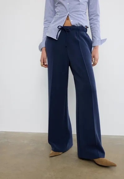 Мягкие джоггеры свободного кроя с отстрочкой- Заказать в России