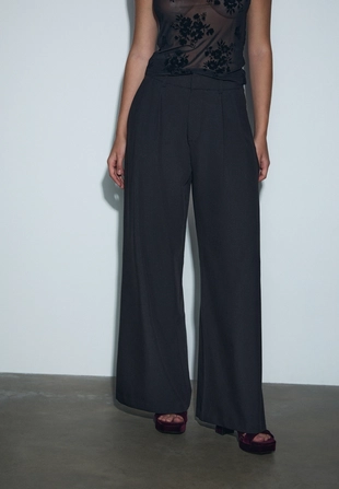 Регулируемые брюки очень широкого кроя- Заказать в России