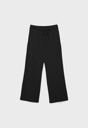 Брюки свободного кроя с мягкими нервами- Заказать в России