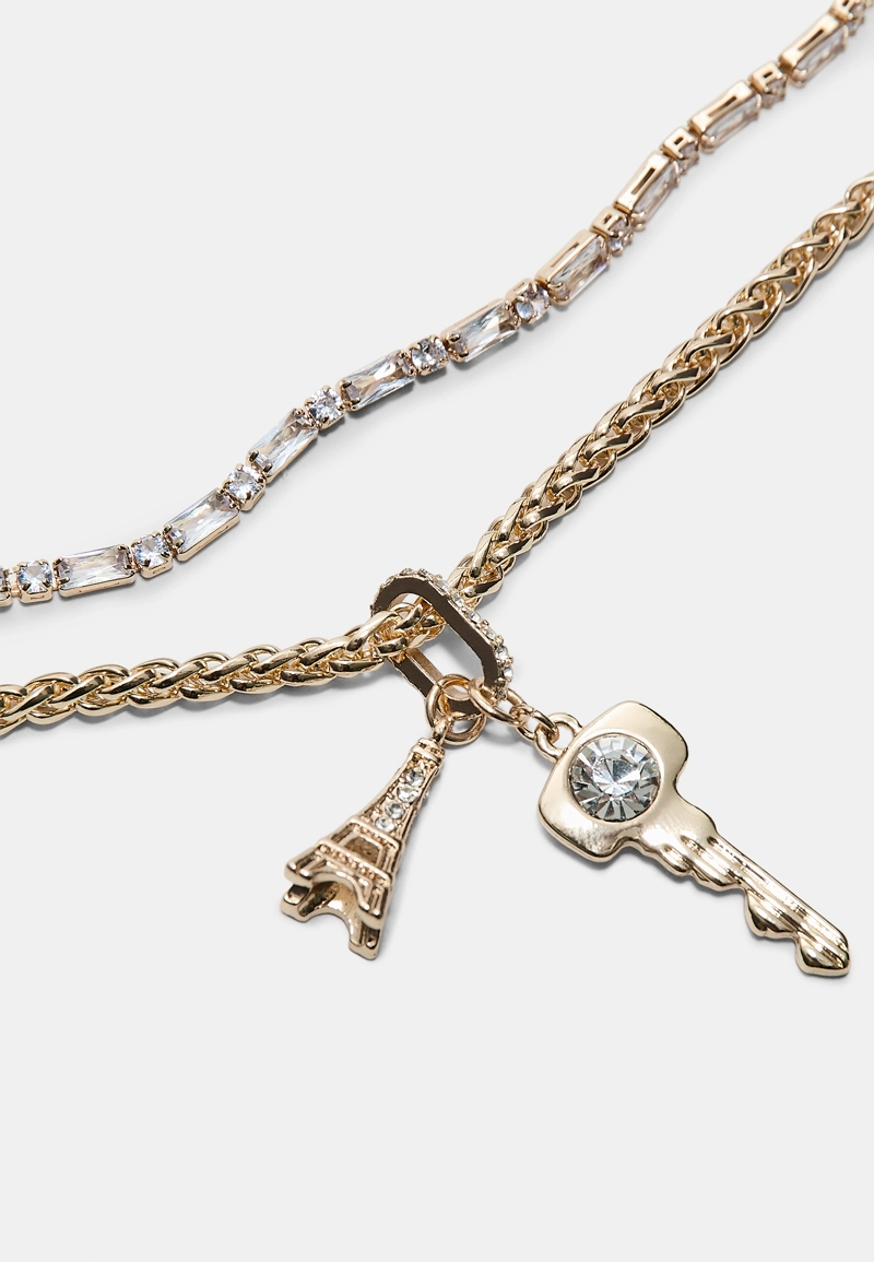 Набор из 2 колье с блестящей отделкой и подвесками