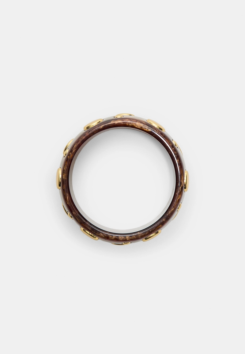 Жесткий браслет с заклепками