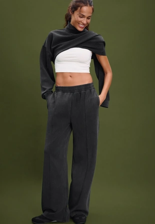 Брюки-джоггеры с эффектом потертости- Заказать в России