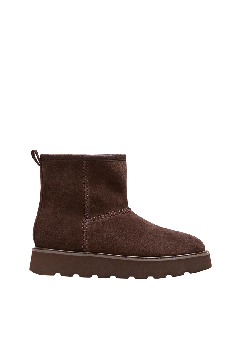 Ботинки из кожи на плоской подошве с меховой подкладкой