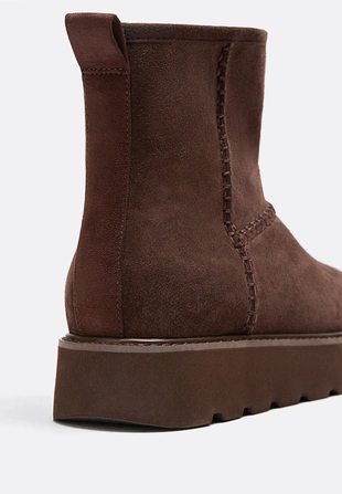 Ботинки из кожи на плоской подошве с меховой подкладкой- Заказать в России