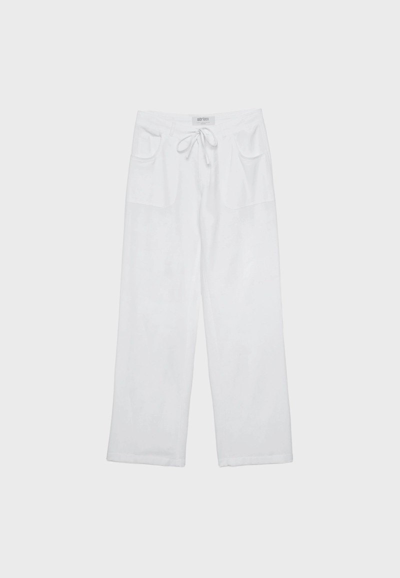 Брюки с карманом из льна