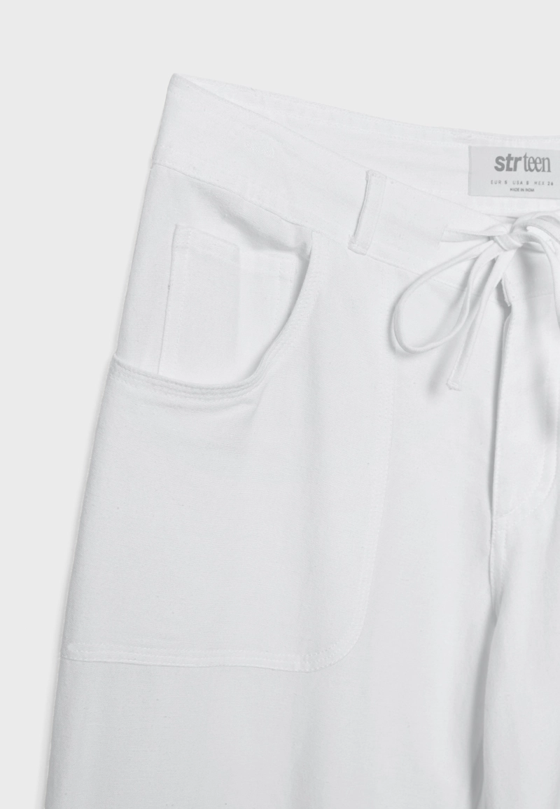 Брюки с карманом из льна