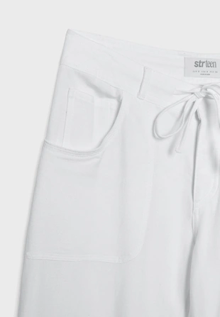 Брюки с карманом из льна- Заказать в России