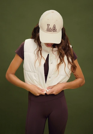 Короткий стеганый жилет- Заказать в России