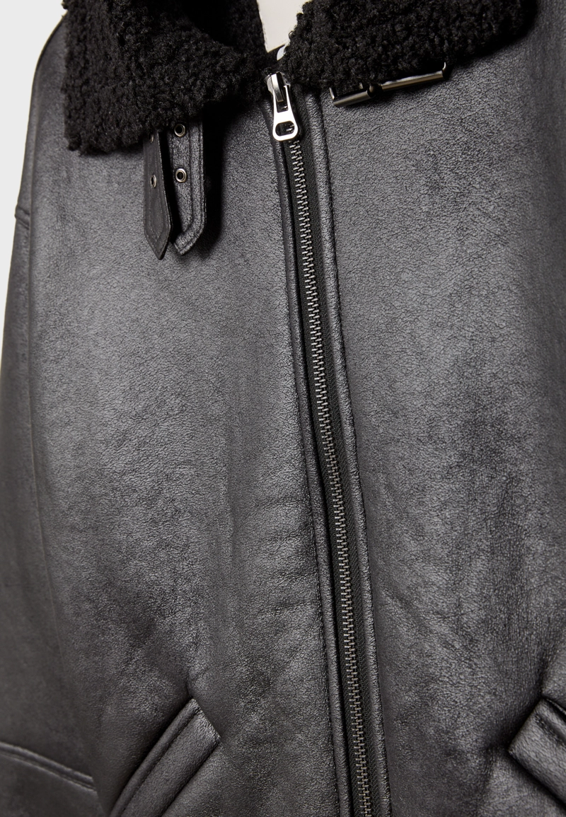 Двусторонняя куртка с пряжками