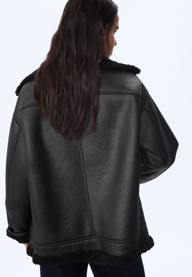 Двусторонняя куртка с пряжками