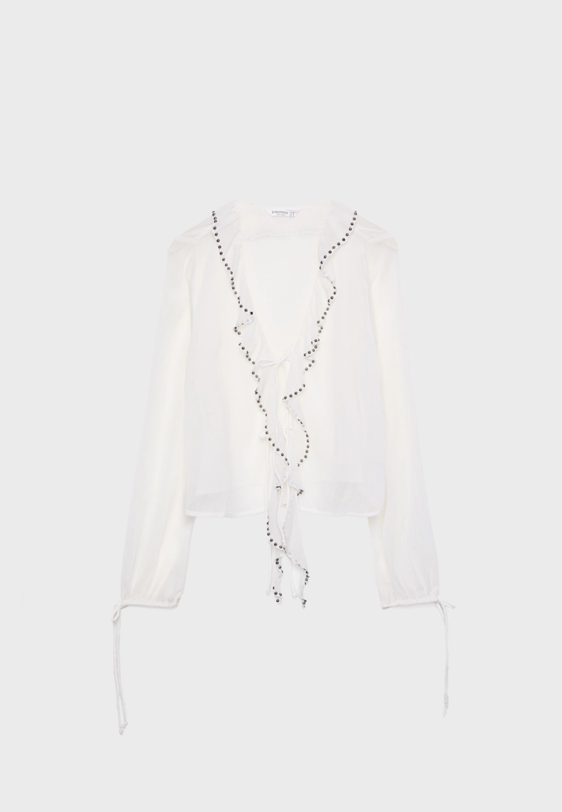 Блузка с вышивкой, воланами и заклепками