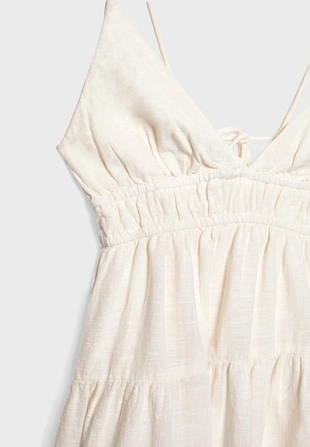 Короткое струящееся платье с завязками на спине- Заказать в России