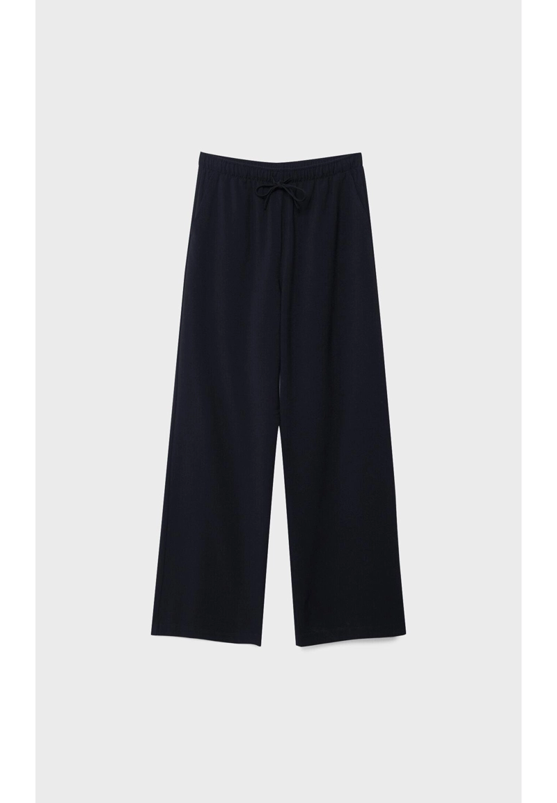 Длинные струящиеся нарядные брюки