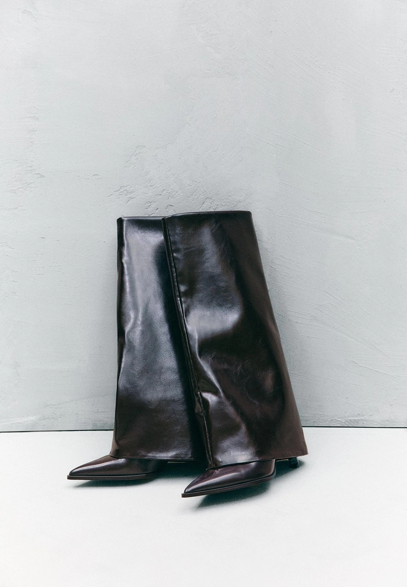 Высокие сапоги на шпильке с ползунками