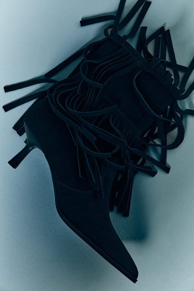 Botines tacón flecos piel