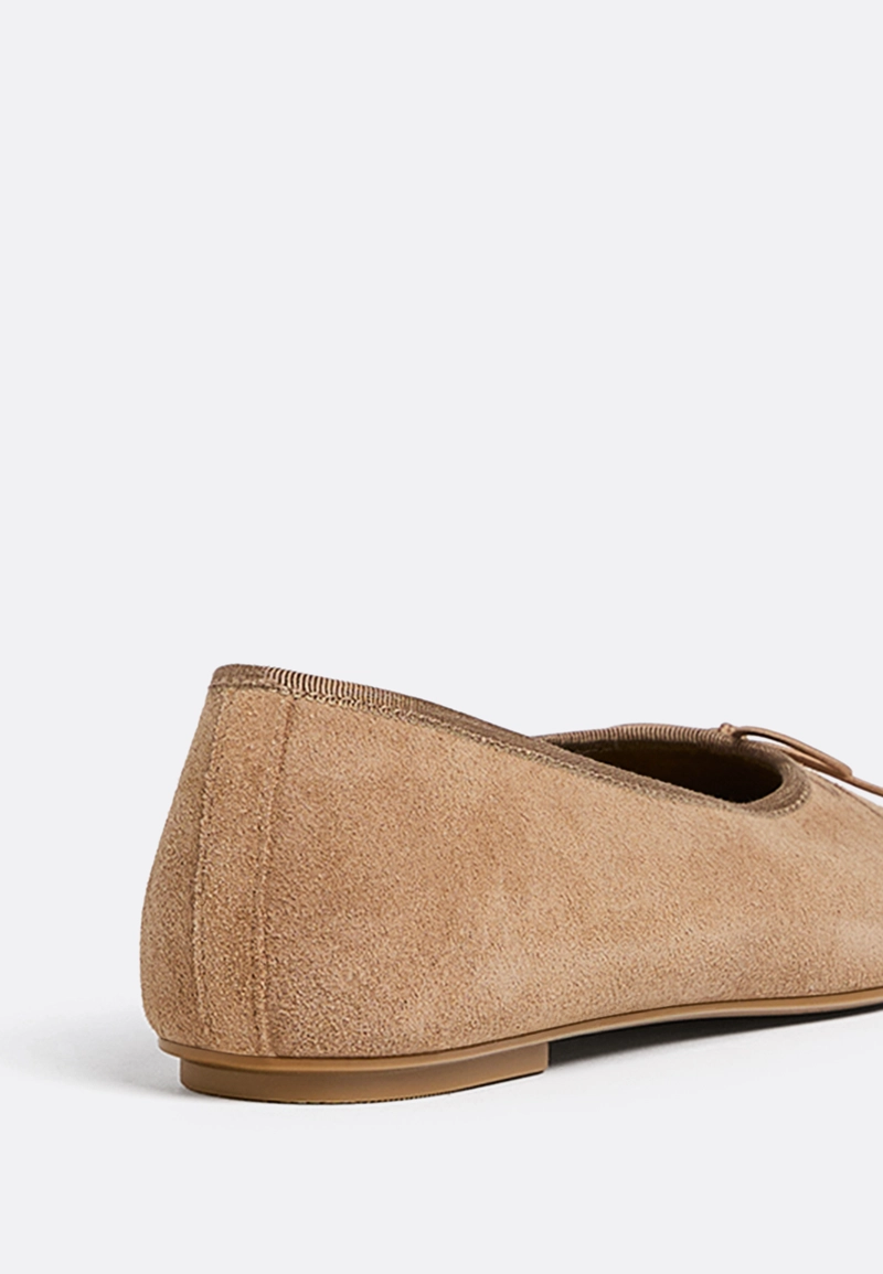 Кожаные балетки с бантом