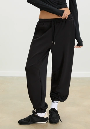 Мягкие джоггеры свободного кроя- Заказать в России