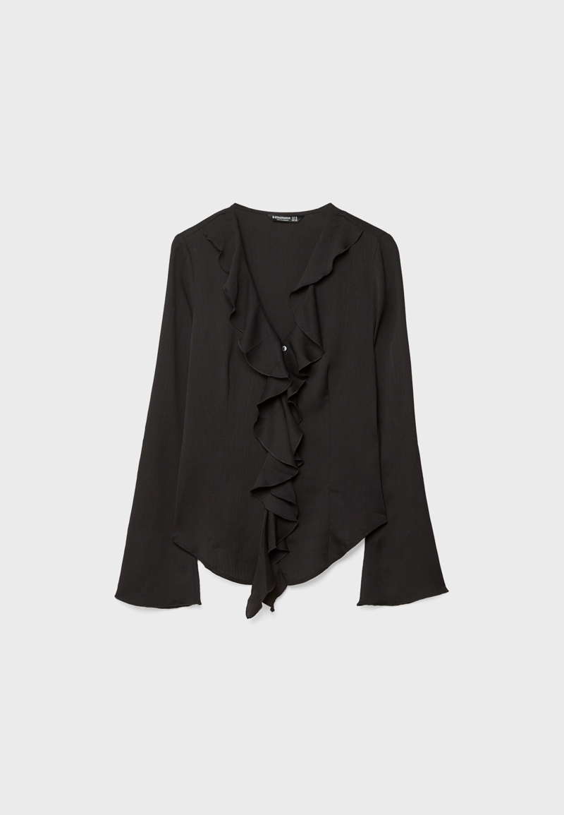 Блузка свободного кроя с воланами