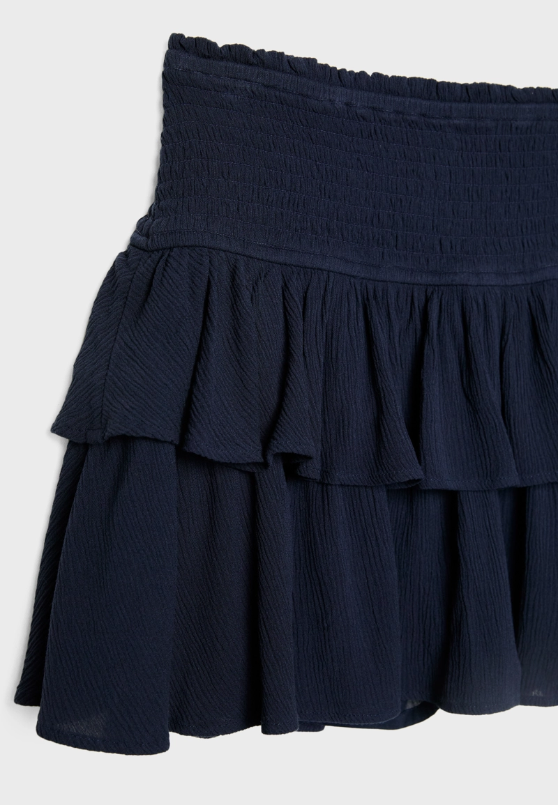 Мини-юбка-брюки с воланами