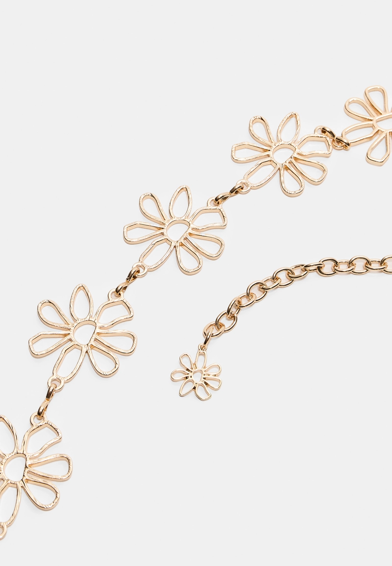 Металлический ремень с цветами