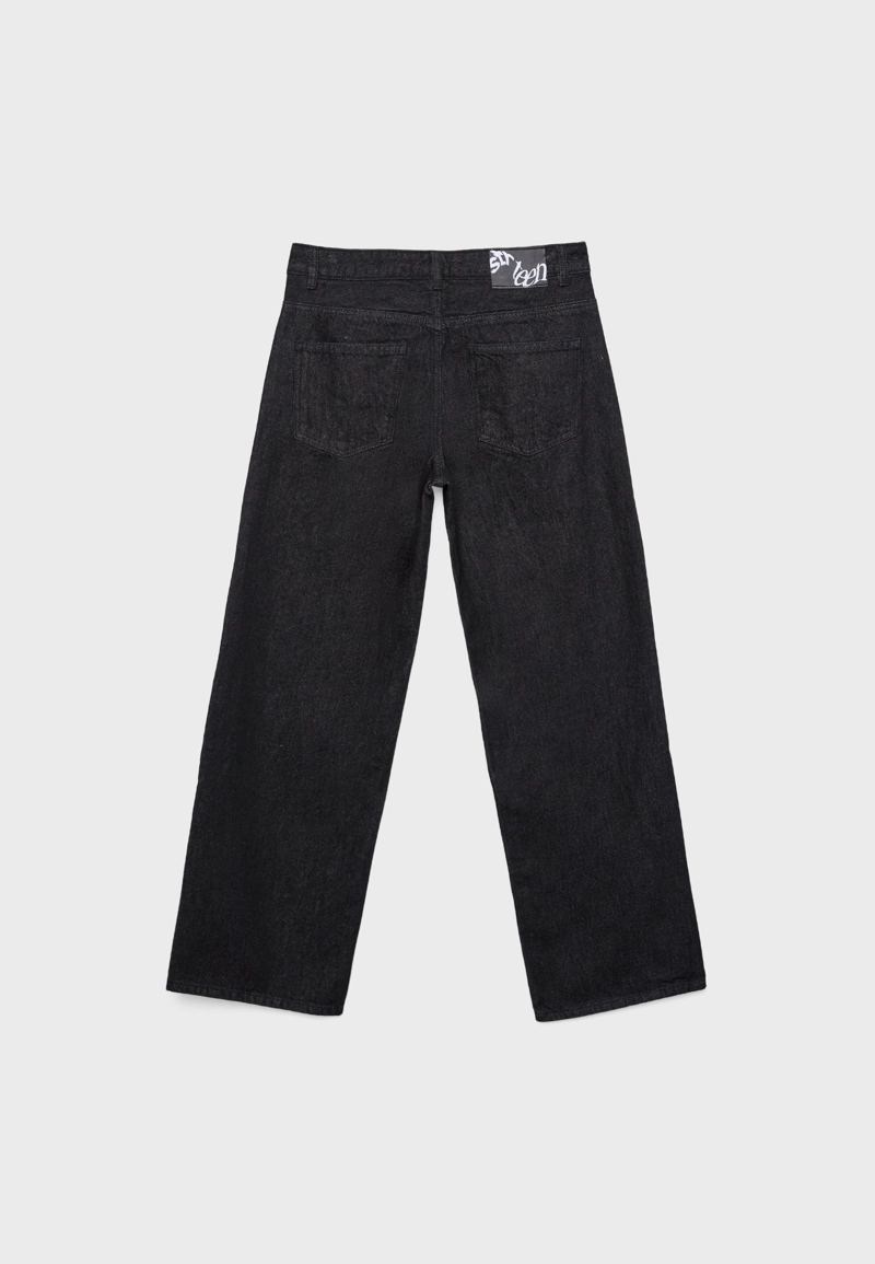 Джинсы-багги свободного кроя