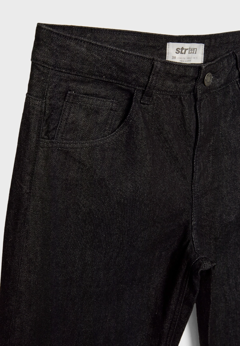 Джинсы-багги свободного кроя