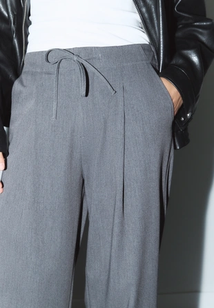 Брюки с защипами и шнурками- Заказать в России