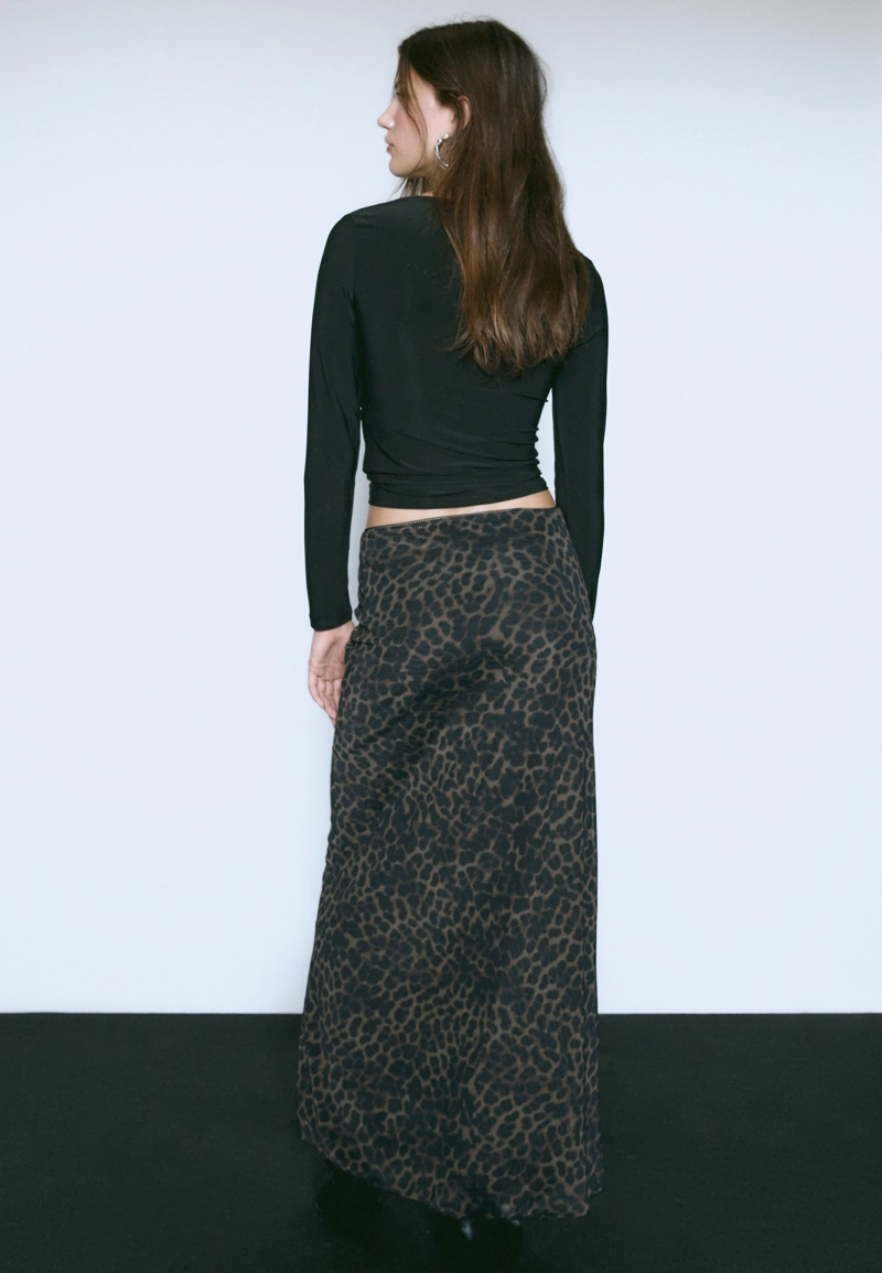 Юбка миди из полупрозрачной ткани с леопардовым принтом