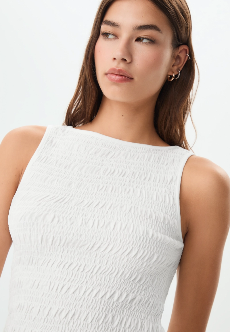 Футболка с оборками и сборками