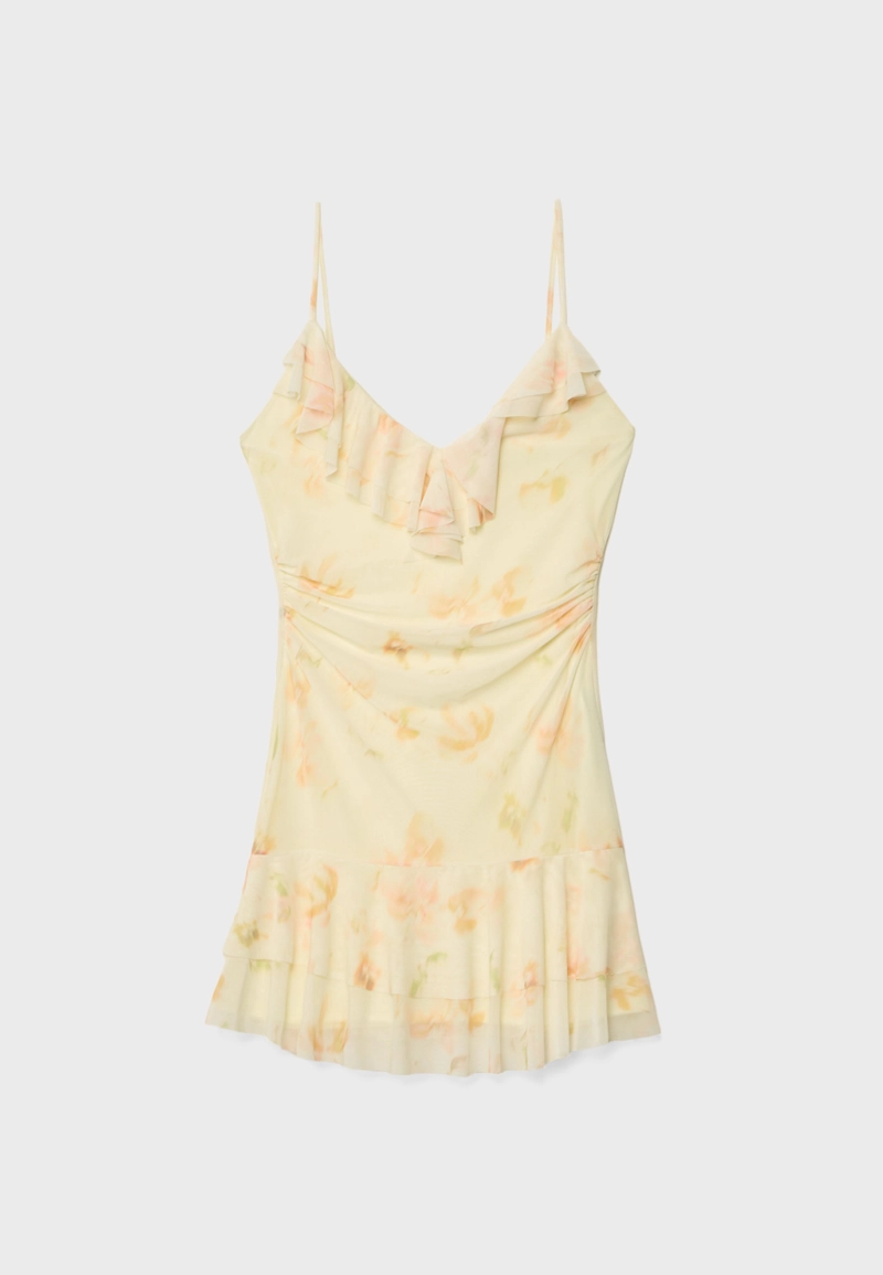 Короткое платье из полупрозрачной ткани с воланами и принтом