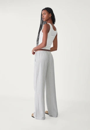 Легкие брюки в полоску с льняной тканью- Заказать в России