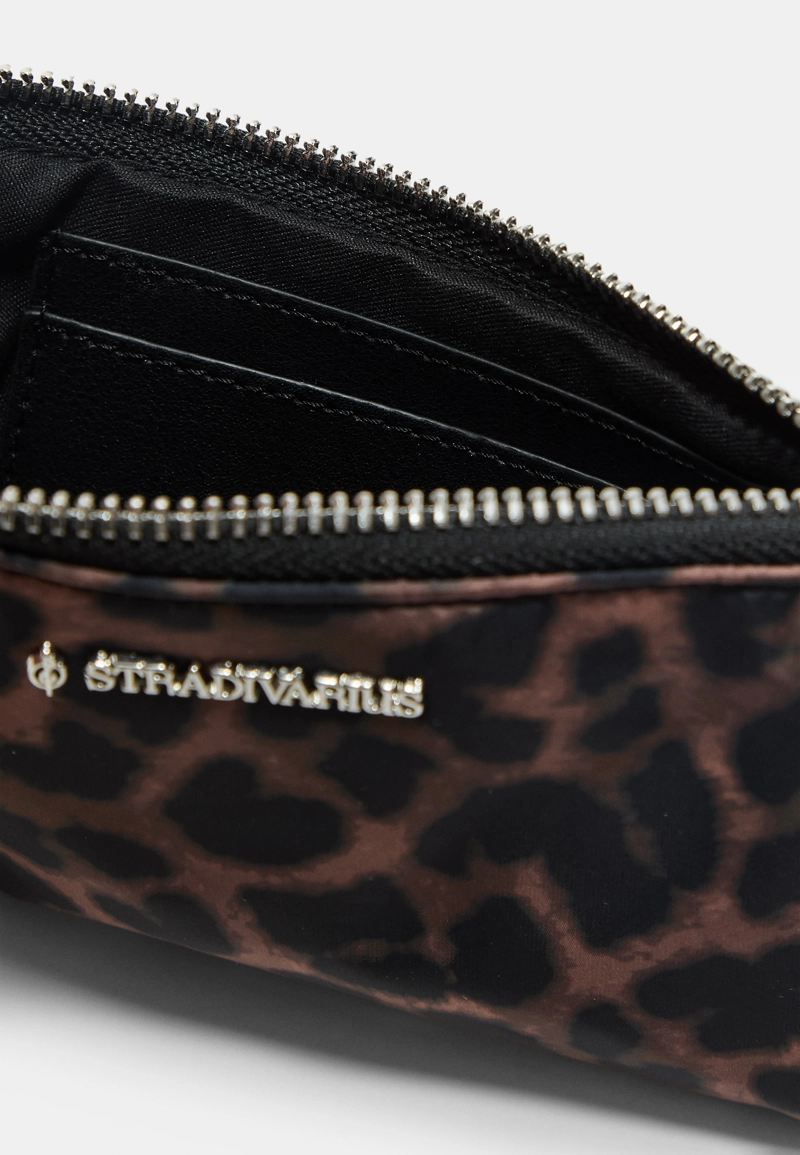 Косметичка на молнии с леопардовым принтом