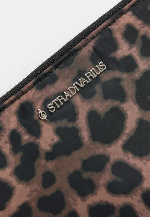 Косметичка на молнии с леопардовым принтом- Заказать в России