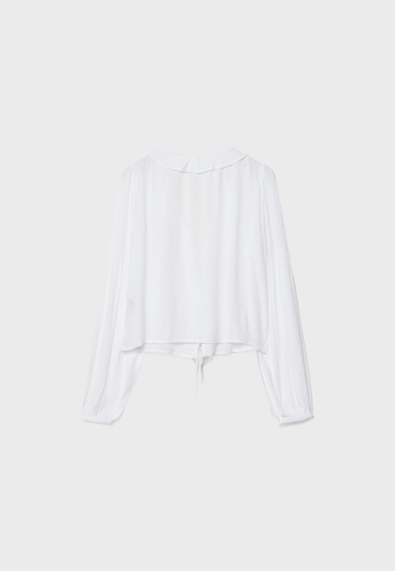 Блузка с воланами