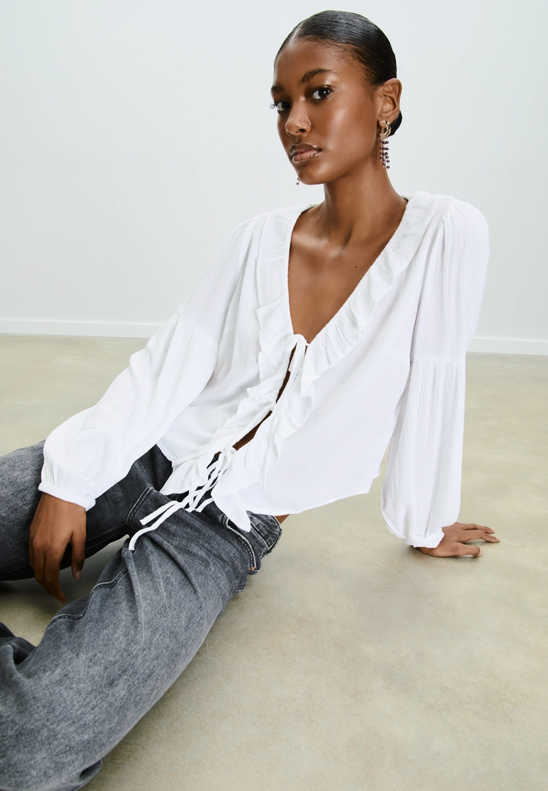 Блузка с воланами