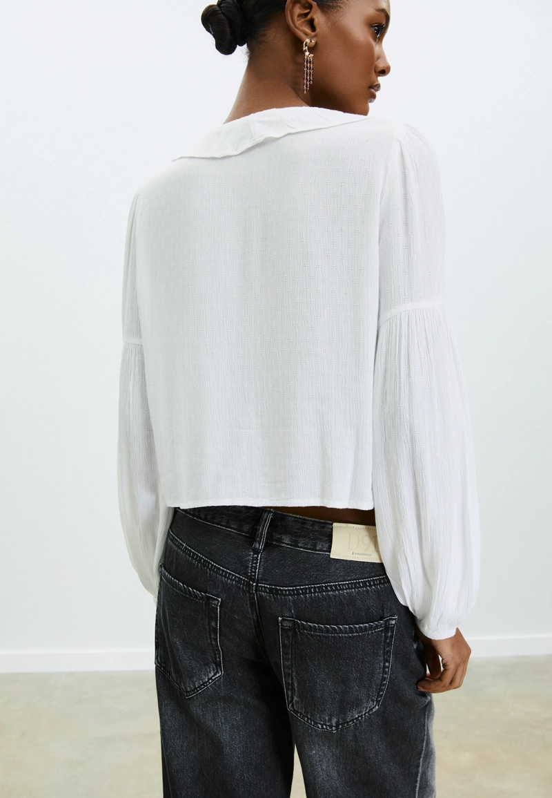 Блузка с воланами